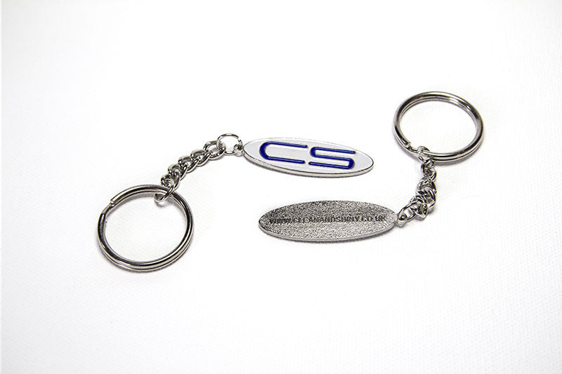 Clean and Shiny metal enamel "CS" Keyring